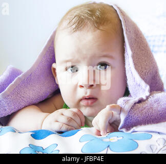 Baby in bed Stock Photo