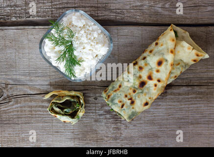 Spinach pie baked on a wood-fired Stock Photo