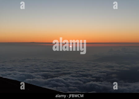 Sunset on Maui viewed from the top of Haleakala Stock Photo