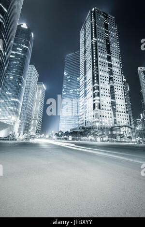 modern buildings at night and road Stock Photo