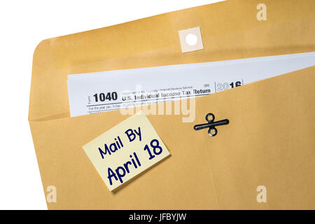 Tax Day reminder for April 18 on envelope Stock Photo