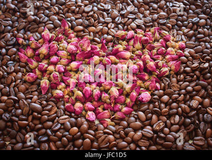 I heart you made of flowers, leaves, berries and coffe beans. Stock Photo