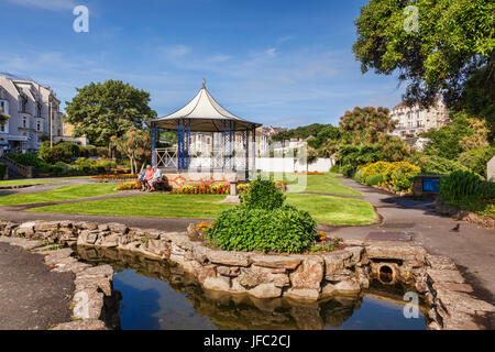 14 June 2017: Ilfracombe, Devon, England, UK - The bandstand in Runnymede Gardens on a warm summer day, Stock Photo