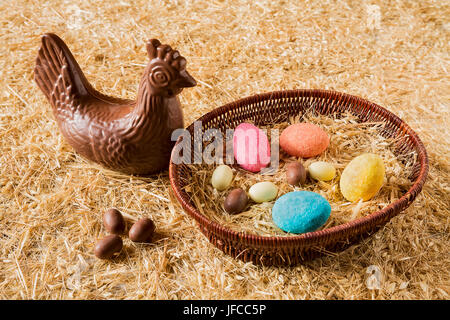 Easter chocolate eggs over the straw Stock Photo