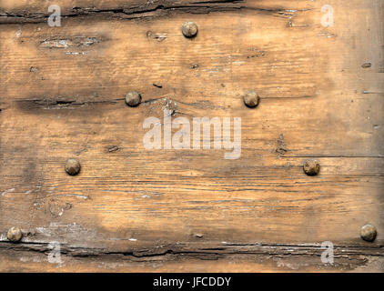 Rusted nails in wood Stock Photo