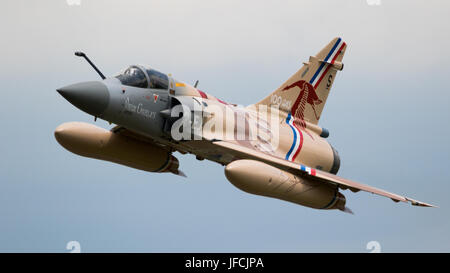 FLORENNES, BELGIUM - JUN 15, 2017: Special painted French Air Force Dassault Mirage 2000 fighter jet flyby over Florennes Airbase Stock Photo