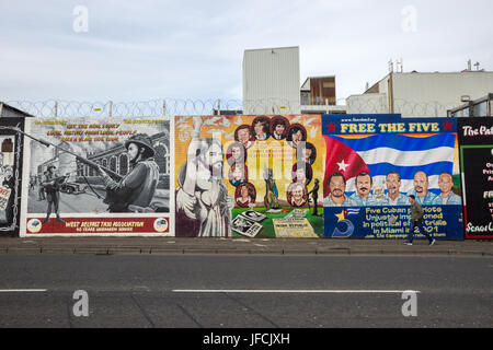 BELFAST, NORTHERN IRELAND - FEB 9, 2014: Political mural in Belfast, Northern Ireland. Falls Road is famous for its political murals.