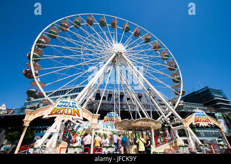 Hamburg, Germany - MAY 7: Ferris wheel on the fair at the Hamburg Harbour Birthday Festival on May 7, 2011 in Hamburg, Germany. Stock Photo