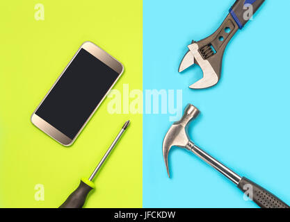 Smartphone repair concept for cellphone fixing company's marketing. Fix broken telephones and solve virus spyware problems. Stock Photo