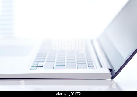 Modern marketing, small business and technology background. Close up of a blurry laptop with free empty blank copy space for text or content. Dynamic Stock Photo