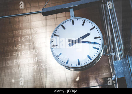 Time management and scheduling concept. Analog clock surrounded with digital time codes, AM and PM. Stock Photo