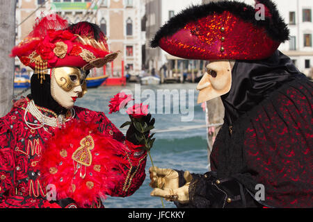VENICE - FEBRUARY 7: Costumed people during Venice Carnival on February 7, 2013 in Venice, Italy. This year the Carnival was held between January 26 - Stock Photo