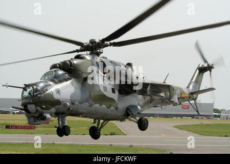 LIEGE-BIERSET, BELGIUM - MAY 13: Czech Air Force Mi/24 Hind attackhelicopter take off on the Bierset Heli-meet May 13, 2007 in Liege-Bierset, Belgium Stock Photo