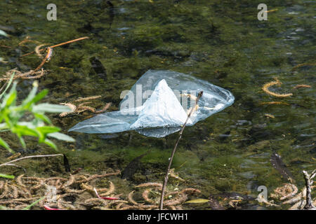 Plastic waste in the water Stock Photo