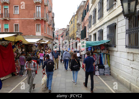 Pedestrians and street vendors on Rio Tera Lista di Spagna near Campo San Geremia, Venice Stock Photo