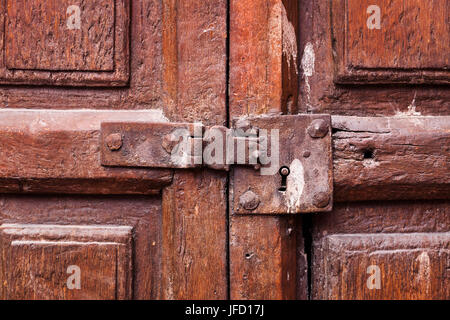 door with a keyhole and latch Stock Photo