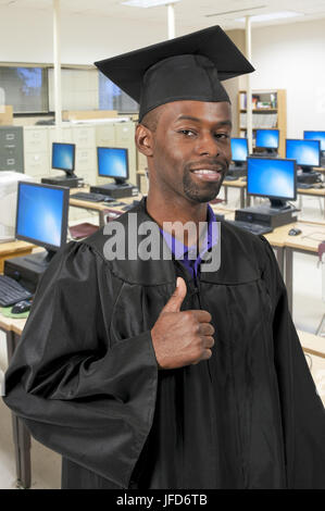 Black Man Graduate Stock Photo