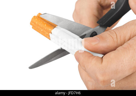 Hand with scissors and cigarettes Stock Photo