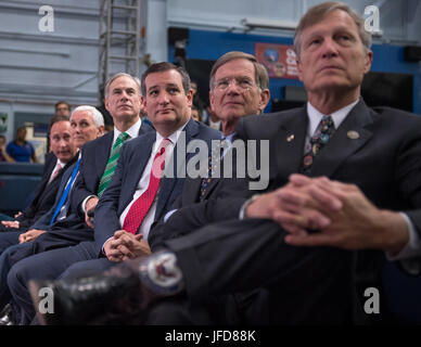 Acting NASA Administrator Robert Lightfoot, left, Vice President Mike Pence, Texas Gov. Greg Abbott, Senator Ted Cruz, (R-TX),  Lamar Smith, R-Texas, and Rep. Brian Babin, R-Texas, right, are seen during an event where NASA introduced 12 new astronaut candidates, Wednesday, June 7, 2017 at NASA’s Johnson Space Center in Houston, Texas. After completing two years of training, the new astronaut candidates could be assigned to missions performing research on the International Space Station, launching from American soil on spacecraft built by commercial companies, and launching on deep space missi Stock Photo