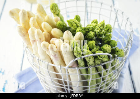White and Green Asparagus in Basket Stock Photo
