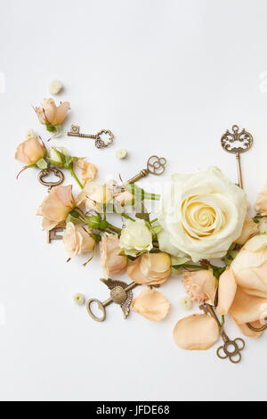 Red roses with key Stock Photo