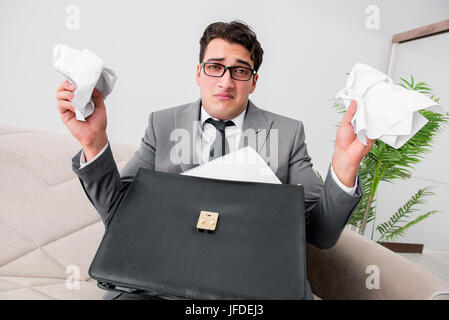 Angry businessman with crumbled paper Stock Photo