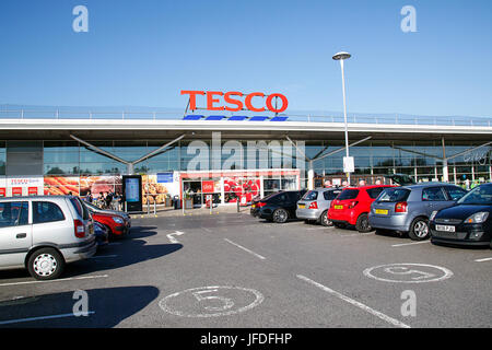 Front view of a Tesco Superstore in Wales. Tesco PLC is a British multinational grocery and general merchandise retailer. Stock Photo