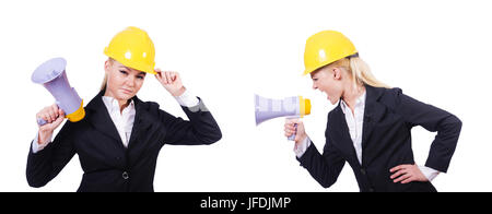 Female construction worker with loudspeaker Stock Photo
