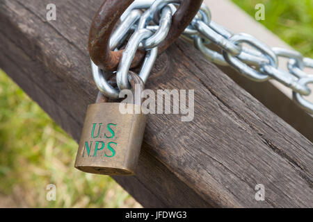 Walla Walla County, Washington: NPS padlock securing a replica Oregon Trail wagon at Whitman Mission National Historic Site. Initially founded as a mo Stock Photo