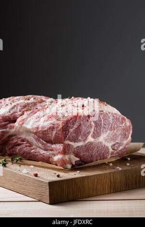 Photo of raw meat. Pork neck with herbs Stock Photo