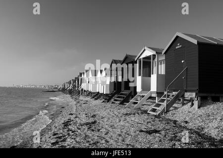 Black and white image of beach huts, at Thorpe Bay, near Southend-on-Sea, Essex, England Stock Photo