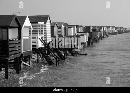 Black and white image of beach huts, at Thorpe Bay, near Southend-on-Sea, Essex, England Stock Photo