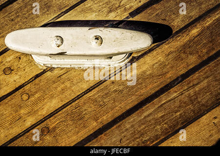 A cleat on the deck of a sailboat in San Diego, CA. Stock Photo