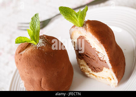 Marble rum balls with mint closeup on a plate on a table. horizontal Stock Photo
