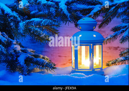 Stilllife, Christmas, winter, lantern in the snow Stock Photo