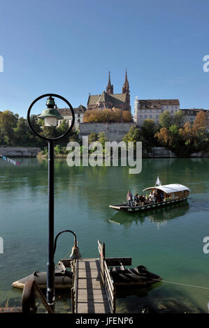 Switzerland, Canton Basel-Stadt, Basel, The left bank of the river Rhine, Big Basel, and the Cathedral District with the Cathedral and the Münster ferry crossing river Rhine Stock Photo