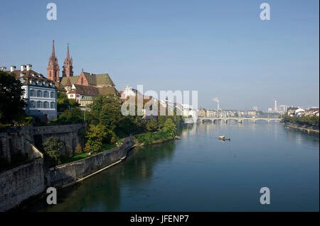 Switzerland, Canton Basel-Stadt, Basel, The left bank of the river Rhine, Big Basel, and the Cathedral District with the Cathedral and the Münster ferry crossing river Rhine Stock Photo