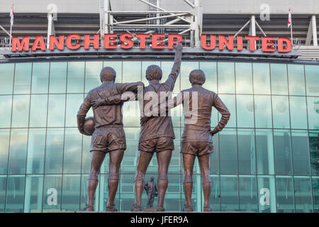 England, Manchester, Salford, Old Trafford Football Stadium, The Holy Trinity Statue Stock Photo