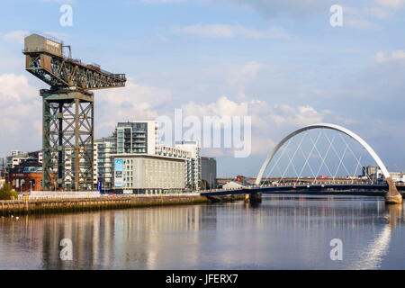 Scotland, Glasgow, Clydebank, Finnieston Crane and Clyde Arc Bridge Stock Photo