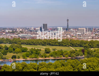 Aerial view across Hyde Park with the Serpentine Lake towards the Post Office Tower in the distance in central London in England Stock Photo