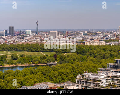 Aerial view across Hyde Park and the Serpentine lake towards the Post Office Tower in the distance in central London in England Stock Photo