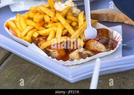 German currywurst with french fries Stock Photo