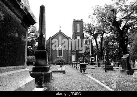 ST. FRANCISVILLE, LOUISIANA, USA - 2009: Tombs in front of historic Grace Episcopal Church. Stock Photo