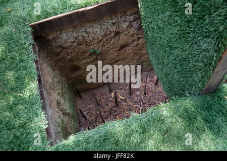 Vietnam war era vietcong booby-trap in Cu Chi, Vietnam, Asia Stock Photo