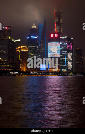 Skyline of the Pudong District viewed from the Bund across the Huangpu River in Shanghai, China Stock Photo