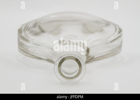 large clear glass bottle isolated Stock Photo