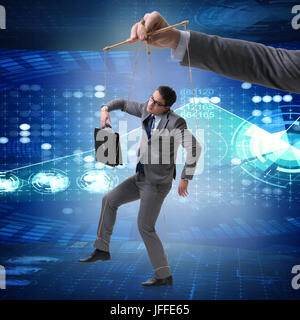 Businessman puppet being manipulated by boss Stock Photo