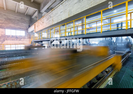 automatic peeling zinc workshop Stock Photo