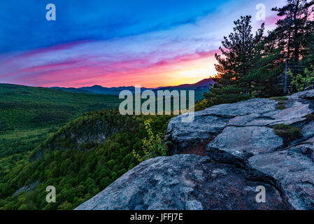 Sunset from ledges atop the Boulder Loop trail, White Mountain National Forest, NH Stock Photo