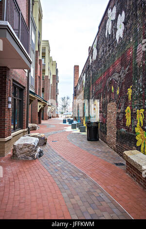 old brick alley in old town during day Stock Photo